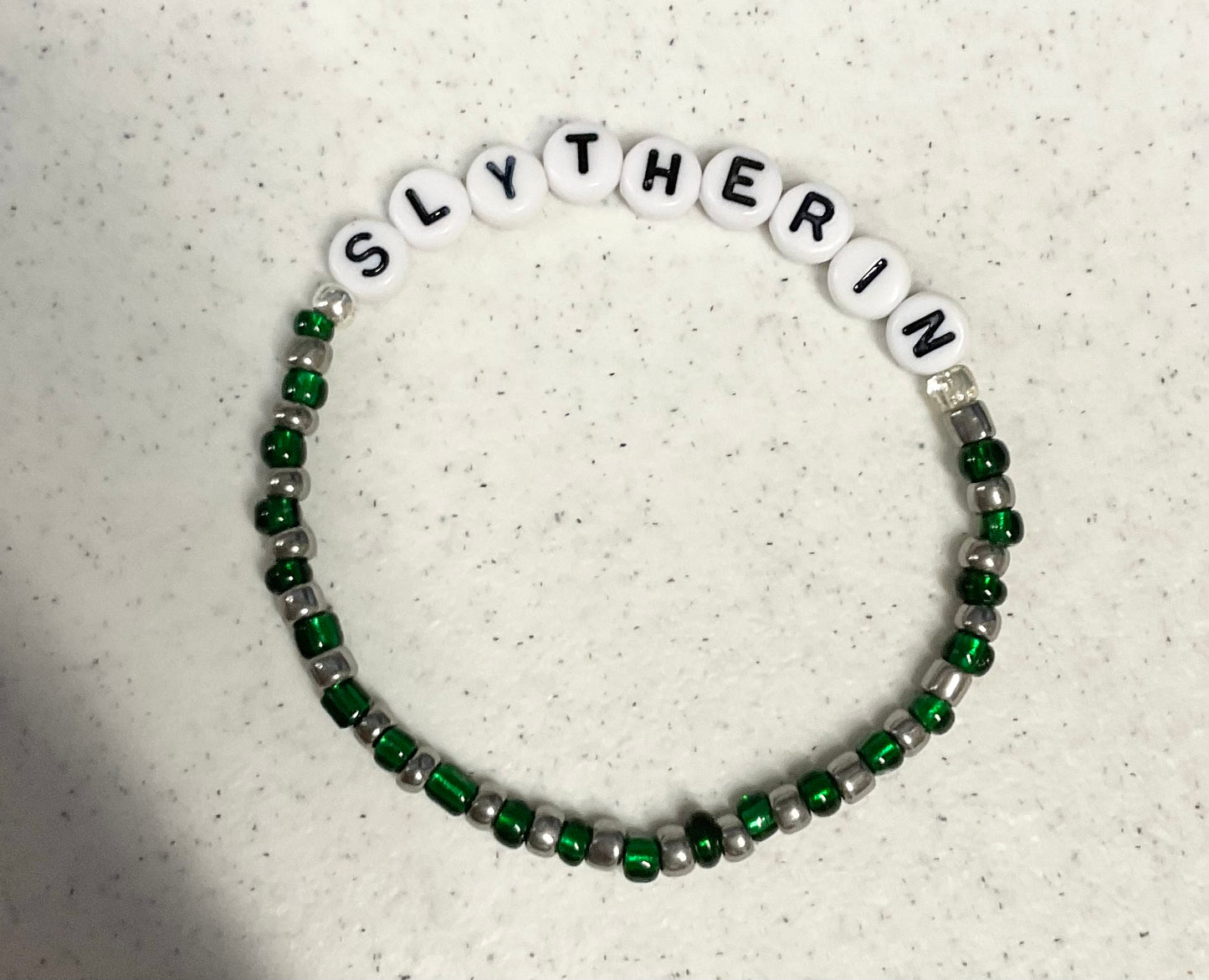Magical green and silver wizard house bracelet