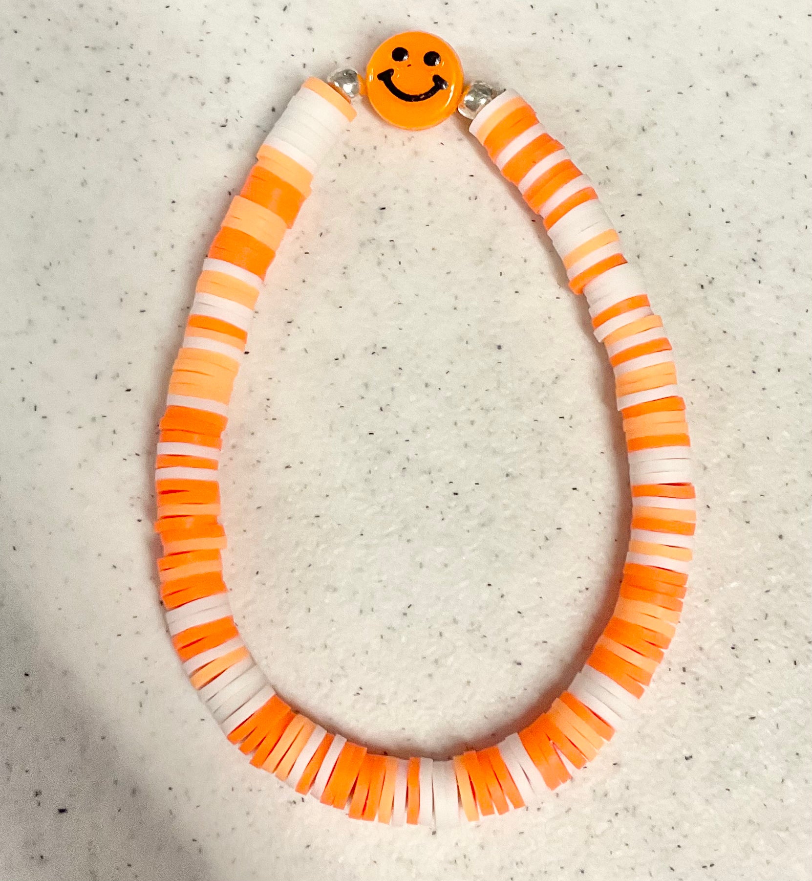 Magical all smiles orange bracelet